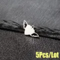 Close up of silver metal heart angel wing pendant, DIY jewelry making accessory detail view. - Steel