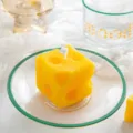 Cute cheese scented candle detail, creative yellow wax cube decoration for home desktop decor. - Square Cheese