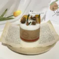 Scented candle with pine cones and dried oranges, aesthetic home decor for bedroom and living room. - Smokeless Scented Candle