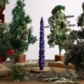 Purple Christmas tree shaped scented candle with wooden base for holiday home decor. - Purple Christmas Tree, Single Piece