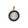 Gold-tone circular pendant featuring white mother-of-pearl portrait, blue and white zircon. - Blue