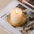 Aesthetic pillar scented soy candle on a gold tray, perfect for home decor and cozy atmosphere. - Gold Oval Tray