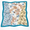 Exquisite multi-pattern silk scarf detail featuring retro floral and leaf prints with blue border. - Blue with Three-Color Flowers