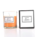 Scented candle in glass jar with orange soy wax and decorative packaging box for home decor. - Bright Orange (Silk)