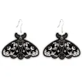 Gothic black and white moth earrings close-up with celestial moon and star pattern details. - Black and White Moon Moth Style