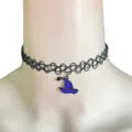 Close-up detail of the black tattoo choker necklace featuring a cute purple witch hat pendant. - Purple Witch Hat (1)
