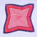 Detailed view of the women's square silk scarf featuring a stylish blue and red striped pattern. - Red Striped Silk Scarf