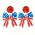 Glitter patriotic bow earring detail featuring red white blue stars and stripes festive design. - Sequin Bow Style (1)