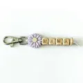 Mother's Day gift keychain with silicone sunflower bead and wooden letter blocks spelling MAMA. - Light Purple Sunflower Style