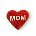 Red glitter heart brooch detail shot, shiny mother gift badge with MOM text display clearly. - MOM Heart Style