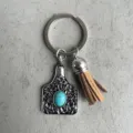Vintage western stijl turkoois legering runderetiket sleutelhanger met lederen kwastje. - Bruine Kwast Stijl / Bruin