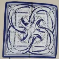 Blue and white square silk scarf featuring classic horse bit and leather belt print. - Navy Chain Print Small Square Satin Scarf