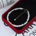 Barocke natürliche Süßwasserperle Halskette mit Goldverlängerungskette und Zirkonia Anhänger. - Armband / 14K Vergoldet