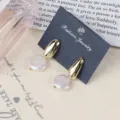 Vintage barock natürliche Süßwasserperle Ohrringe mit Gold Metall für Damen elegant Alltag. - Barock Unregelmäßiger Stil (E2121)