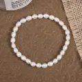 Natürliche Süßwasser Barock Perlen Armband, schlichte vielseitige Alltagsschmuck Damen - Gewinde Reishornperle Stil (B5037) / Perlendurchmesser 4mm