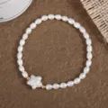 Natürliches Süßwasser Barockperlen Armband mit Stern Anhänger und Goldperlen, elastisch. - Pentagramm (B5104)