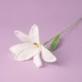 Handmade crochet white lily flower detail view knitted floral ornament for home decor. - White