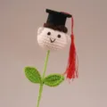 Handmade crochet graduation doll flower detail view, cute wool toy for a gift. - Graduation Season Doll for Boys