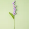 Handmade crochet purple bell flower detail shot, perfect for home decor and romantic gifts. - Purple