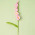 Handmade crochet pink flower detail view, beautiful knitted botanical decor for home or gift. - Pink