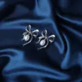 Elegant silver bow brooch with hanging freshwater pearls, chic anti-glare pin accessory for women. - X1032 Teardrop Bowknot Style / Silver