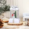 Detailed view of Christmas snow globe lantern with snowman and tree inside a gift box design. - White Snowman