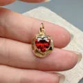 Red heart zircon pendant detail, shiny gold irregular bezel, ideal for DIY necklace jewelry. - Red