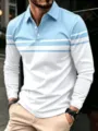 Vista dettagliata della polo a manica lunga da uomo casual bicolore con righe eleganti. - Celeste