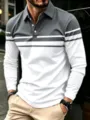 Vista dettagliata polo uomo manica lunga con blocchi di colore, top casual streetwear. - Grigio