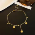 Gold heart anklet for women, titanium steel tassel foot chain, stylish minimalist jewelry. - Gold