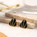 Chic geometric triangle stud earrings with black enamel and gold-plated finish for women. - Black