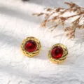 Exquisite 18K gold plated stainless steel stud earrings featuring a bold red center stone. - Style 7
