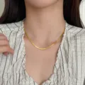 Elegant 18K gold plated stainless steel herringbone snake chain necklace detail view model wear - Flat Snake Chain