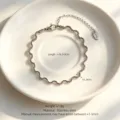 Wavy line stainless steel bracelet with extension chain, minimalist fashion jewelry for women. - Bracelet / Steel