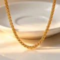 Gold stainless steel woven chain necklace, elegant and fashionable jewelry for women. - 6mm Braided Necklace / Gold