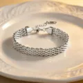 Stylish stainless steel mesh snake bone chain bracelet for women, layered design. - Bracelet / Steel