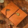 Vintage brown leather DIY photo album with leaf and clock pendants, handmade memory scrapbook. - 18x23cm / Coral Orange