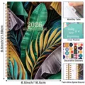 2026 monthly planner notebook with tropical leaf cover, tabs, pocket, and stickers. - English Planner Style B