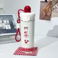 Bonita botella térmica de acero inoxidable 316 con correa de silicona y diseño de conejito. - Conejito rojo