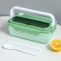 Green bento lunch box with handle and cutlery, perfect for students and office workers. - Green