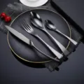 Black stainless steel flatware set, premium mirror polish knife fork spoon for dining. - Black