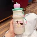 Draagbare 316 roestvrijstalen thermosfles met schattige appelvormige deksel en handige riem. - [Met theezakje] Roze, 480 ml