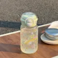 Leuke drinkfles met rietje, dubbele functie en kleurrijk sterrenpatroon voor studenten. - [PC] Groen - [Dual-Drink planeet]