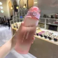 Gradient frosted plastic water bottle, large capacity portable sports drink cup for outdoor fitness. - Matte Pink