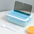 Portable multi-compartment bento lunch box with spoon and chopsticks, light blue and clean. - Aqua