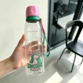 Bouteille d'eau de sport transparente et portable avec couvercle rose et motif de dinosaure. - Tasse / Rose [dragonne incluse] 720ml