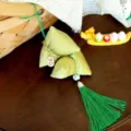 Close up detail of traditional Chinese dragon boat festival fabric zongzi hanging decor with tassel - Tassel Style (Tassel Rice Dumpling)
