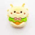 Cute plush bee brooch detail shot, soft yellow furry texture with green collar and bow. - Original (Open Back/No Brooch/No Chain) / Apron Bee