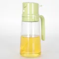 Green glass oil spray bottle for kitchen, 2-in-1 spray and pour dispenser with handle. - 470ml / Green