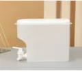 Detail shot of a large plastic cold water kettle with tap, semi-transparent storage container. - Clear White